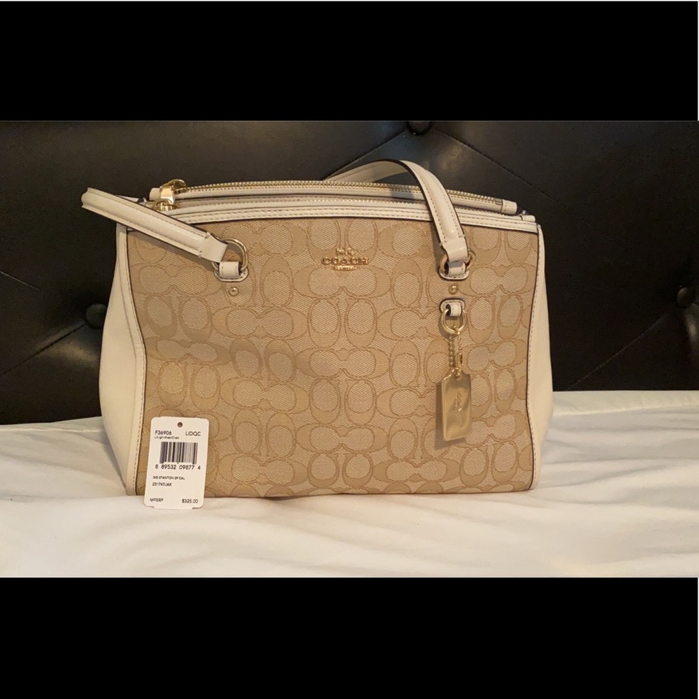 Cream coach purse